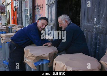 12-24-2014 Tel Aviv Israel. Elderly people pack products in a workshop in Tel Aviv. District next to old Jaffa Stock Photo
