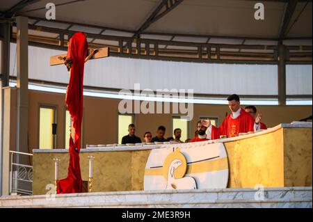 Uncovering and veneration of the Holy Cross on Good Friday in Medjugorje. Stock Photo