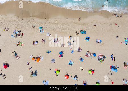 Spain, Majorca, Aerial view of people relaxing on Cala Agulla beach Stock Photo