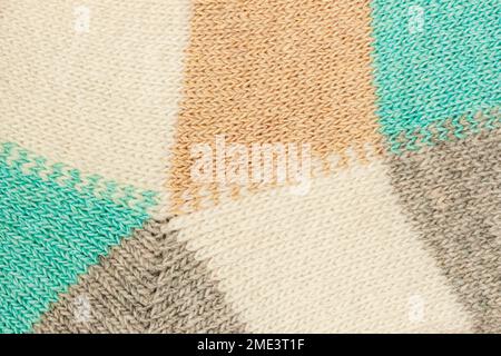 Knitted wool loops background. Soft colorful knitted fabric texture Stock Photo