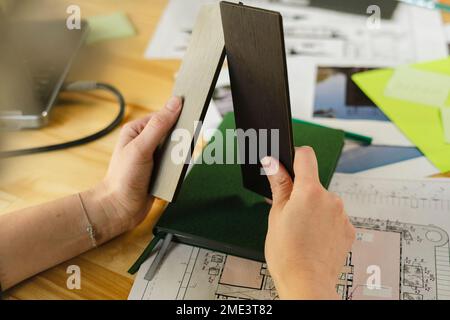 Close-up of architect holding samples in office Stock Photo