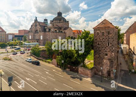 Germany, Bavaria, Nuremberg, City street with Staatstheater Nurnberg in background Stock Photo