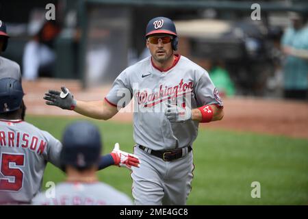 Left to right, Mark Lerner, Washington Nationals owner, Ryan Zimmerman,  third baseman for the Washington Nationals, Dan Snyder, owner of the  Washington Redskins, and Chris Cooley, tight end Washington Redskins attend  an