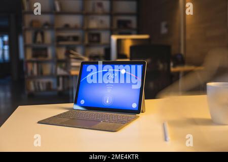 Tablet PC with temperature control dashboard on screen Stock Photo