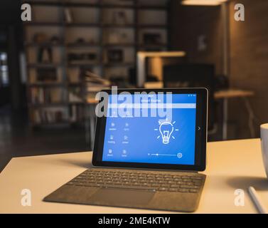 Tablet computer with smart home dashboard on screen Stock Photo
