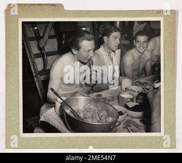 Captured Nazi prisoners of war enjoy American rations after being taken ...