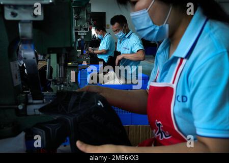 ZHANGJIAKOU, CHINA - FEBRUARY 23, 2023 - A worker works on a drilling tool  production line at Xuanhua Economic Development Zone in Zhangjiakou, Hebei  province, China, Feb 23, 2023. At present, there