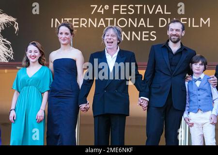 Juliette Benveniste, from left, Vicky Krieps, director Mathieu Amalric, Arieh Worthalter, and Sacha Ardilly pose for photographers upon arrival at the premiere of the film 'The Story of My Wife' at the 74th international film festival, Cannes, southern France, Wednesday, July 14, 2021. (AP Photo/Brynn Anderson)