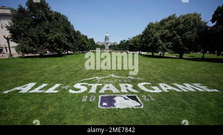 A logo is painted on the lawn outside the McNichols Civic Center Building as part of festivities leading up to the playing of the Major League Baseball All Star Game on Saturday, July 10, 2021, in Denver. A traveling exhibit of art from the Negro Leagues Baseball Museum in Kansas City, Mo., being staged at McNichols is one of many events held on All Star Game weekend in the Mile High City. (AP Photo/David Zalubowski)