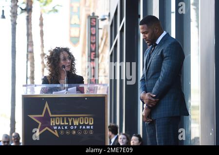 Michael Strahan, left, and Constance Schwartz-Morini surprise fans