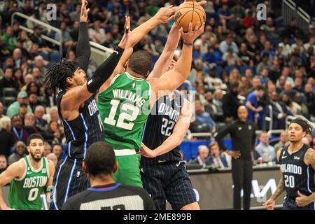 Orlando, Florida, USA, January 23, 2023, Boston Celtics forward Grant Williams #12 attempt to make a basket but is blocked by Franz Wagner #22 at the Amway Center.  (Photo Credit:  Marty Jean-Louis) Credit: Marty Jean-Louis/Alamy Live News Stock Photo
