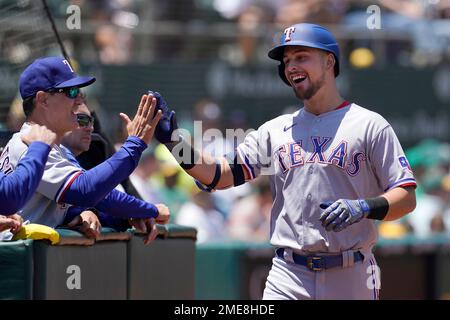 Texas Rangers' Joey Gallo is congratulated by teammates during a baseball  game against the Oakland Athletics in Oakland, Calif., Thursday, July 1,  2021. (AP Photo/Jeff Chiu Stock Photo - Alamy