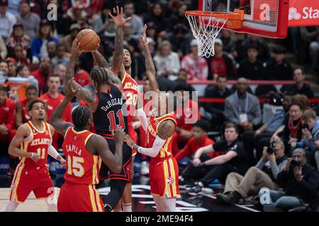 Chicago, USA. 23rd Jan, 2023. DeMar DeRozan (11 Chicago Bulls) is guarded by 4 Atlanta Hawks players Clint Capela (15 Atlanta Hawks) Trae Young (11 Atlanta Hawks) John Collins (20 Atlanta Hawks) and Dejounte Murray (5 Atlanta Hawks) during the game between the Chicago Bulls and Atlanta Hawks on Monday January 23, 2023 at the United Center, Chicago, USA. (NO COMMERCIAL USAGE) (Foto: Shaina Benhiyoun/Sports Press Photo/C - ONE HOUR DEADLINE - ONLY ACTIVATE FTP IF IMAGES LESS THAN ONE HOUR OLD - Alamy) Credit: SPP Sport Press Photo. /Alamy Live News Stock Photo