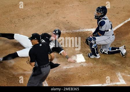 United States' Andrew Vaughn scores on a single hit by Robert Dalbec in the  seventh inning of the Premier12 baseball tournament bronze-medal game  against Mexico at Tokyo Dome in Tokyo Sunday, Nov.