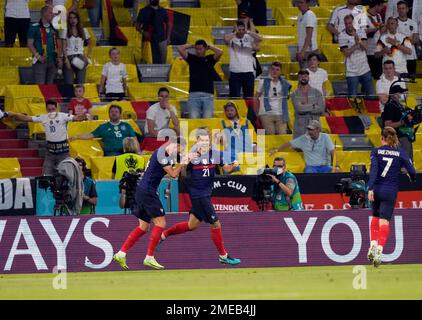 Germany's Mats Hummels, centre, heads on goal during the Euro 2020