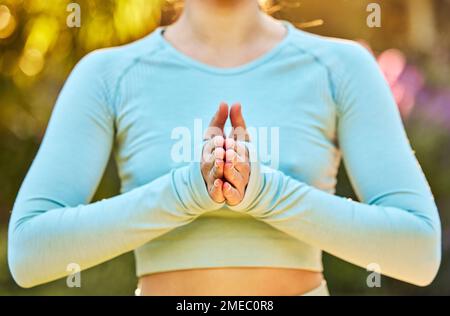 Yoga meditation, zen and body of woman meditate for spiritual mental health, chakra energy balance or soul aura healing. Nature hands, freedom or Stock Photo