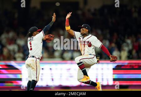 Atlanta, GA, USA. 04th July, 2019. Atlanta Braves infielder Ozzie Albies  (left) celebrates with outfielder Ronald Acu-a Jr. (right) after winning a  MLB game against the Philadelphia Phillies at SunTrust Park in