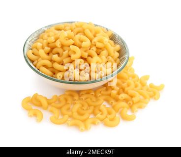 Bowl of raw elbow pasta on white background Stock Photo