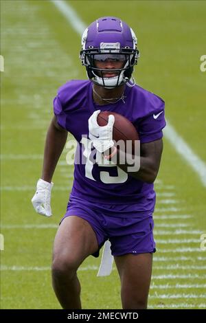 Minnesota Vikings rookie wide receiver Joe Webb, right, joins quarterbacks  Tarvaris Jackson, left, and R.J. Archer, center, during Organized Team  Activities (OTA) NFL football workouts Wednesday, May 19, 2010 in Eden  Prairie