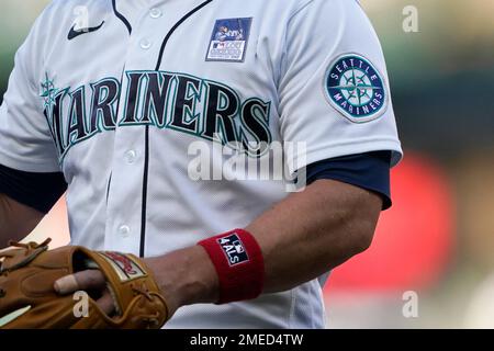 Seattle Mariners third baseman Kyle Seager wears a patch on his
