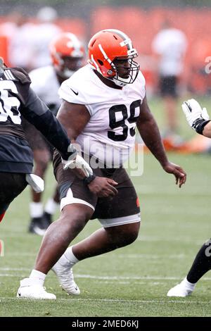 Cleveland Browns defensive tackle Andrew Billings warms up before an NFL  football game against the New York Giants, Sunday, Aug. 22, 2021, in  Cleveland. The Browns won 17-13. (AP Photo/David Dermer Stock