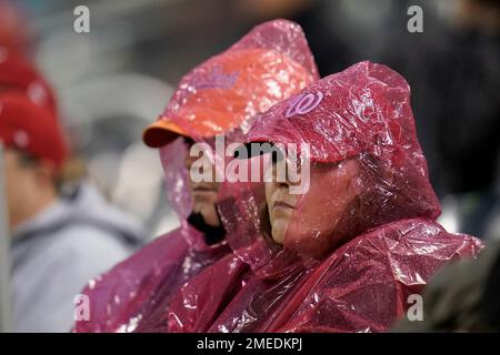 Washington Nationals' fans wear rain gear on the Nationals' opening day  game against the Atlanta Braves at Nationals Park in Washington, March 31,  2011. UPI/Kevin Dietsch Stock Photo - Alamy