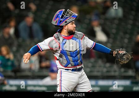 Texas Rangers catcher Jose Trevino (23) in the ninth inning of a baseball  game Thursday, June 3, 2021, in Denver. The Rockies won 11-6 to sweep the  three-game series. (AP Photo/David Zalubowski