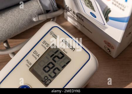 London. UK- 01.22.2023. Close up of a blood pressure monitor by Omron Corporation. Stock Photo