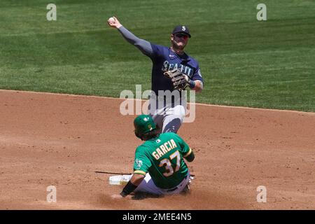 Seattle Mariners' Ty France removes his batting gear after striking out  against the Detroit Tigers in a baseball game, Saturday, July 15, 2023, in  Seattle. (AP Photo/Lindsey Wasson Stock Photo - Alamy