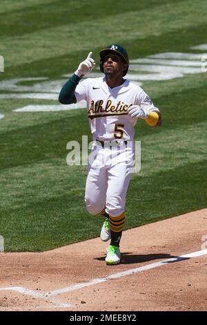 Tony Kemp of the Oakland Athletics reacts to field a ground ball