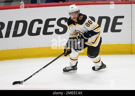Boston Bruins right wing David Pastrnak (88) skates with the