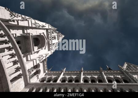 Hungarian Parliament building detail against stormy sky, low angle view Stock Photo