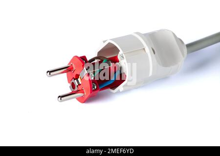 Electric plug with outlet isolated on white background. European electric plug assembly. dismantled electric plug Stock Photo