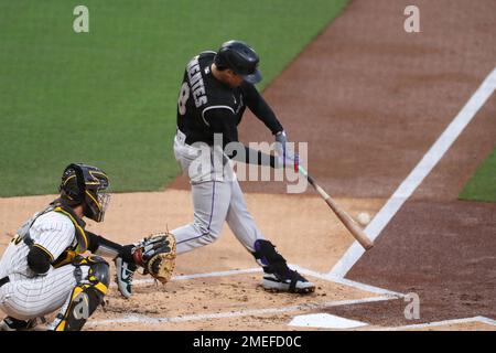 Colorado Rockies starting pitcher German Marquez, third baseman Josh  Fuentes and first baseman C.J. Cron, from left, celebrate after the second  game of the team's baseball doubleheader against the New York Mets