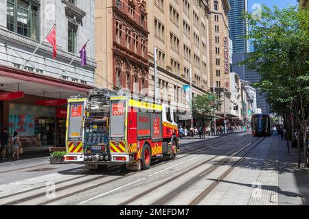 Australian fire brigade, NSW Fire and Rescue brigade truck on George street in Sydney city centre,NSW,Australia Stock Photo