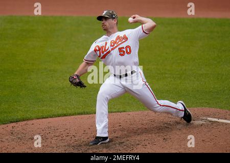 Baltimore Orioles relief pitcher Bruce Zimmermann watches the ball