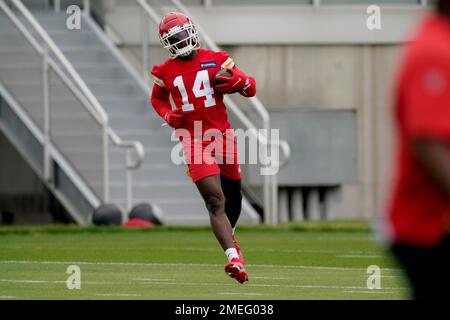 Kansas City Chiefs rookie wide receiver Jonathan Baldwin, center, gets  tackled, after his first NFL catch, by Tampa Bay Buccaneers linebacker  Tyrone McKenzie, right, and safety Larry Asante, 22, left, during preseason