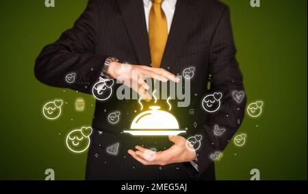 Hand holding food related icons Stock Photo