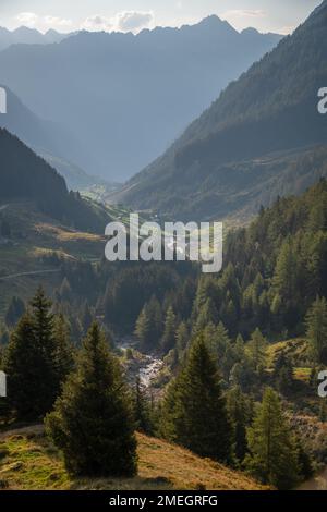 A valley in switzerland surrounded by mountains Stock Photo