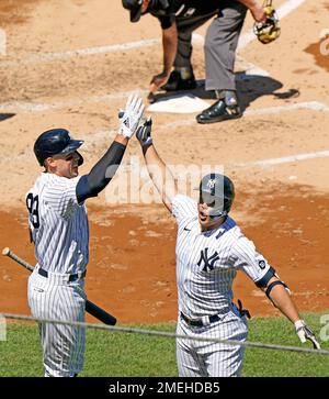 New York Yankees designated hitter Giancarlo Stanton breaks his bat on an  RBI single scoring Aaron Judge in the fifth inning against the Baltimore  Orioles at Yankee Stadium on Thursday, April 28