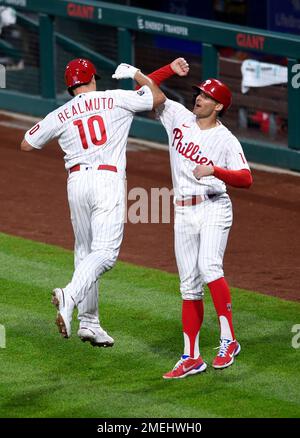 Philadelphia Phillies' Brad Miller is congratulated by his