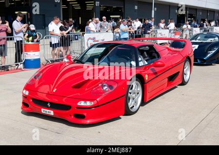 Three-quarters Front View  of a red Ferrari F50,preparing for the Yokohama Legends Track Parade, at the 2022 Silverstone Classic Stock Photo