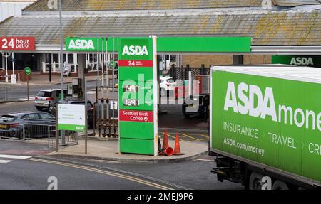 Brighton UK 24th January 2023 - Fuel prices at an Asda petrol station in Brighton have continued to fall with unleaded petrol dropping below £1.50 a litre : Credit Simon Dack / Alamy Live News Stock Photo