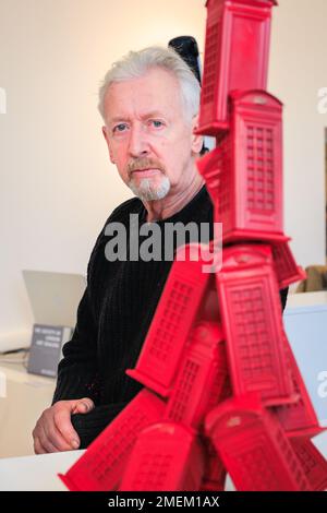 London, UK. 24th Jan, 2023. David Mach with the Telephone Box Maquette I, 2019. Scottish sculptor David Mach returns to London to showcase monumental pieces in his exhibition Heavy Metal, displayed with Pangolin London until 25th March 2023. Credit: Imageplotter/Alamy Live News Stock Photo