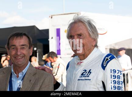 Stuart Graham with Derek Bell, before the Demonstration of Group C Cars, at the 2022 Silverstone Classic Stock Photo