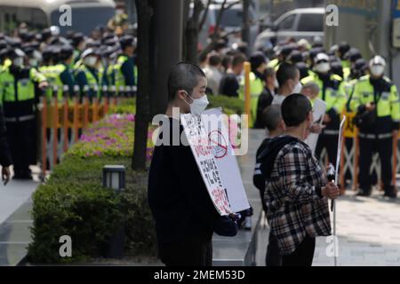 https://l450v.alamy.com/450v/2mem53d/south-korean-university-students-stand-after-having-their-hairs-shaved-during-a-protest-to-denounce-a-decision-by-the-japanese-government-in-front-of-a-building-which-houses-japanese-embassy-in-seoul-south-korea-tuesday-april-20-2021-japans-government-announced-on-april-13-it-would-start-releasing-treated-radioactive-water-from-the-wrecked-fukushima-nuclear-plant-into-the-pacific-ocean-in-two-years-its-a-move-thats-fiercely-opposed-by-fishermen-residents-and-japans-neighbors-ap-photolee-jin-man-2mem53d.jpg