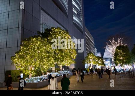 January 18, 2023, Tokyo, Japan: Commuters walk by the headquarters of the East Japan Rail Company (JR East) outside Shinjuku Station, the world's busiest train station by passenger volume...The Japanese economy remains stagnant as workers' wages have not increased in 30 years at the same time as the Bank of Japan's longtime negative interest rates have caused the Yen to struggle against the US Dollar due to the United States' Fed Funds rate hikes to combat inflation. This has promoted severe international trade concerns as Japan is a major trading partner with America. (Credit Image: © Taidgh Stock Photo