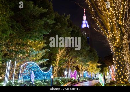 January 18, 2023, Tokyo, Japan: Winter illumination displays outside the headquarters of the East Japan Rail Company (JR East) outside Shinjuku Station, the world's busiest train station by passenger volume...The Japanese economy remains stagnant as workers' wages have not increased in 30 years at the same time as the Bank of Japan's longtime negative interest rates have caused the Yen to struggle against the US Dollar due to the United States' Fed Funds rate hikes to combat inflation. This has promoted severe international trade concerns as Japan is a major trading partner with America. (Cred Stock Photo