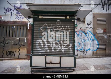 A graffiti art on a small booth in a street of Sheung Wan district in Hong Kong Stock Photo