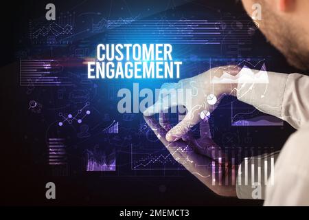 Businessman touching huge screen concept Stock Photo